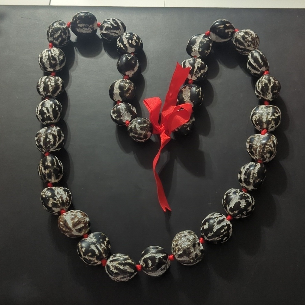 Black and White Carved Kukui Nut Lei with Red Ribbon Chunky Statement Necklace